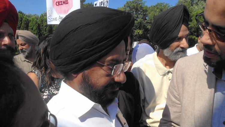 Inderjit Singh Mukker, the Darien man who was beaten in his car Sept. 8, 2015, after a news conference held Sept. 15 along Cass Avenue where the attack occurred. (Kimberly Fornek, Chicago Tribune)