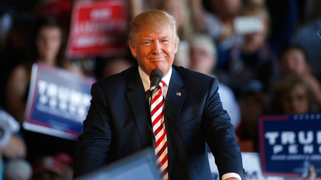 Republican presidential candidate Donald Trump approaches the podium to speak at a rally on October 18, 2016 in Grand Junction Colorado. Trump is on his way to Las Vegas for the third and final presidential debate against Democratic rival Hillary Clinton. (Photo by George Frey/Getty Images)